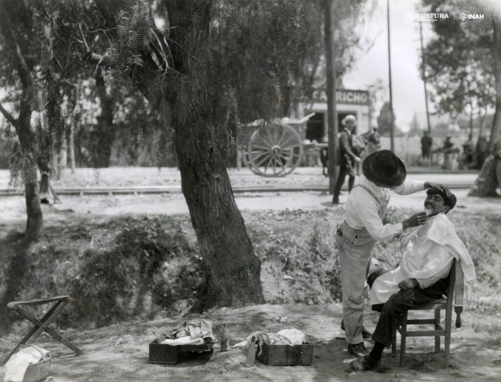 Peluqueros con paisaje en CDMX