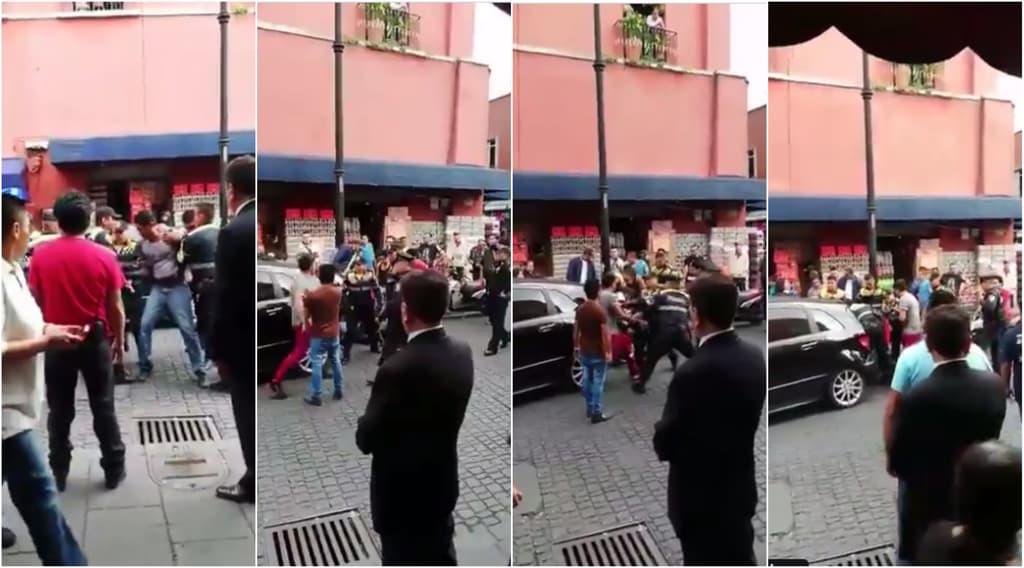 policías golpean a un automovilista