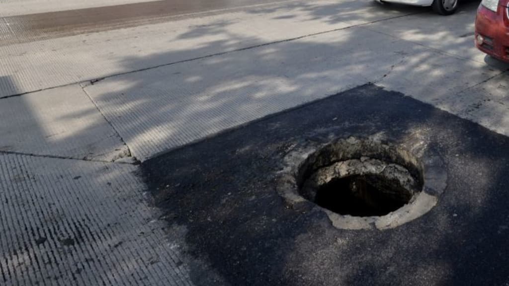 rescataron a un hombre de una coladera