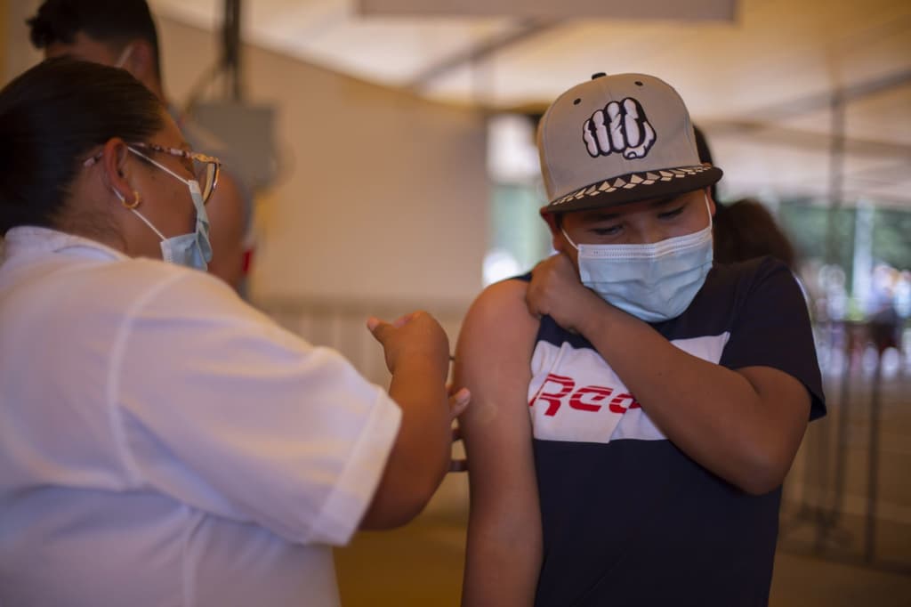 vacunación de 12 años en adelante