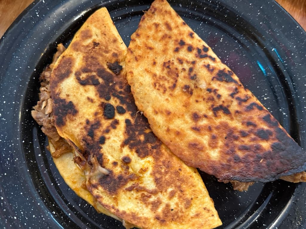 Quesabirrias de Cuatro de Barrio en Ciudad de México.